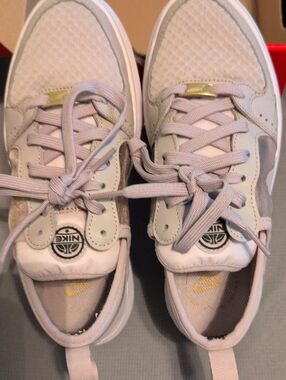 Nike Kids Pastel Pink and Gold Accent Sneakers